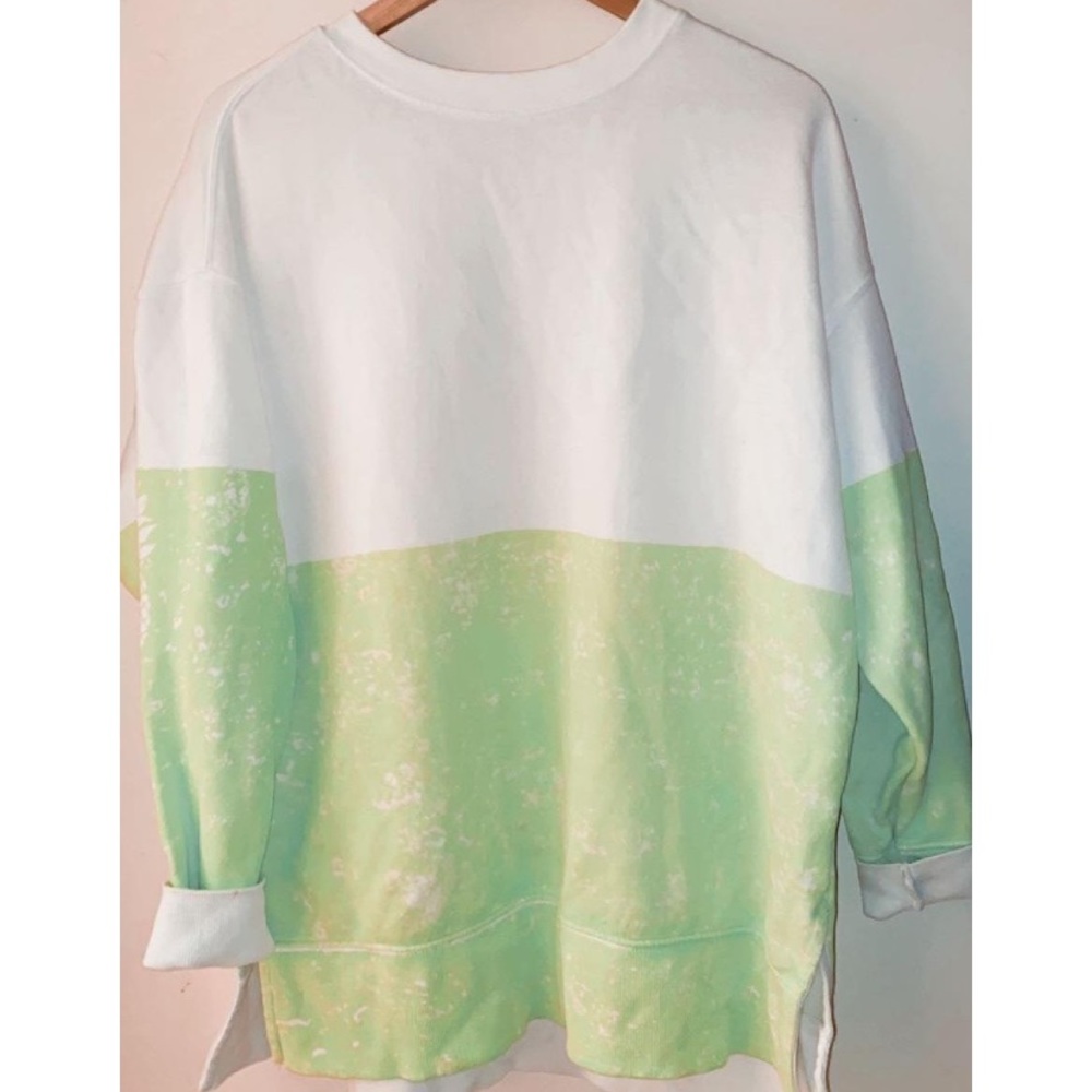 neon green and white oversized sweatshirt